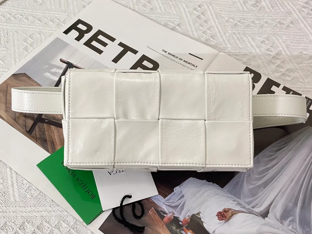 #𝐓𝐇𝐄 𝐁𝐄𝐋𝐓 𝐂𝐀𝐒𝐒𝐄𝐓𝐓𝐄 Checkered waist bag cassette has an updated version🆕The waxed cowhide material is very light and shiny, has a cool feeling, and has the same high-end touch as always. ⚠️The second-generation upgraded version has a long strap of 136cm, tall people can also wear it cross-body at will It is also suitable for boys. It is suitable for couples. It can be used as a handbag, waist bag, crossbody or shoulder bag. It’s small and exquisite, but packs a punch: 💄lipstick 🕶️sunglasses, etc.⋯pack it all! It continues the square shape of the cassette bag and does not deform after loading. It has a very concave shape! Model; 6815# S18.5x5x9.5